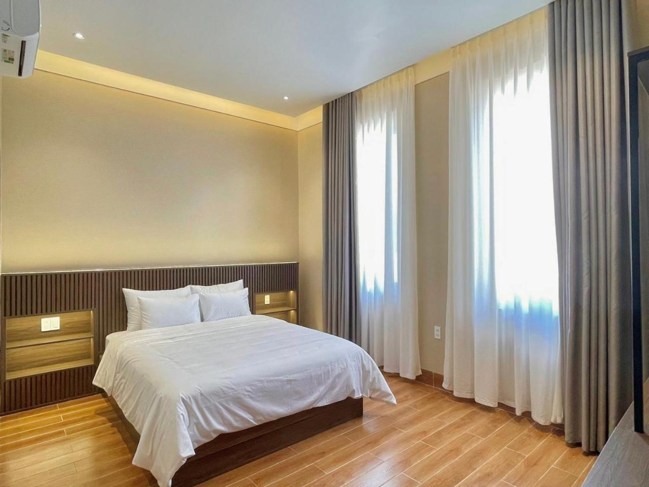 Mela Hotel My Thach Екстериор снимка