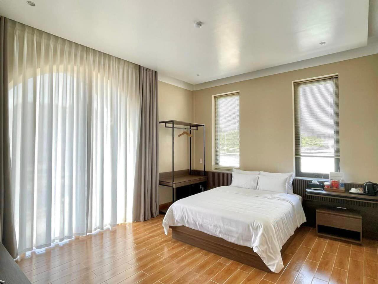 Mela Hotel My Thach Екстериор снимка