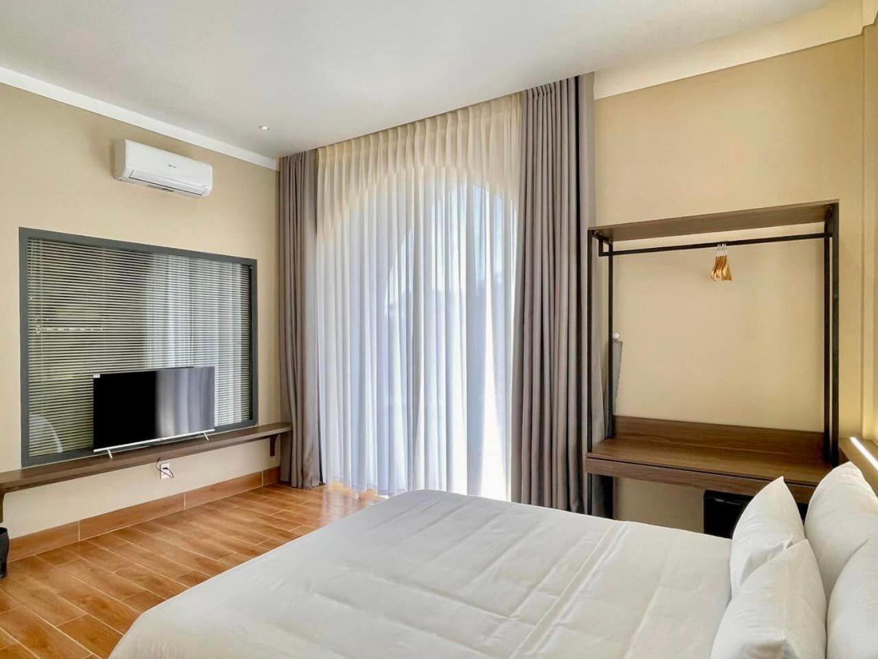 Mela Hotel My Thach Екстериор снимка