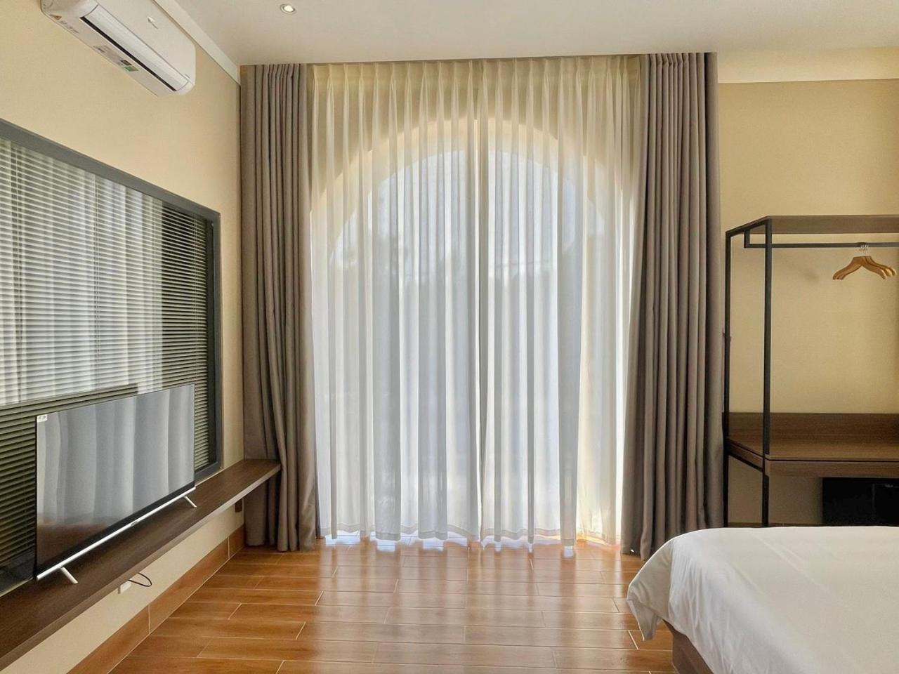 Mela Hotel My Thach Екстериор снимка