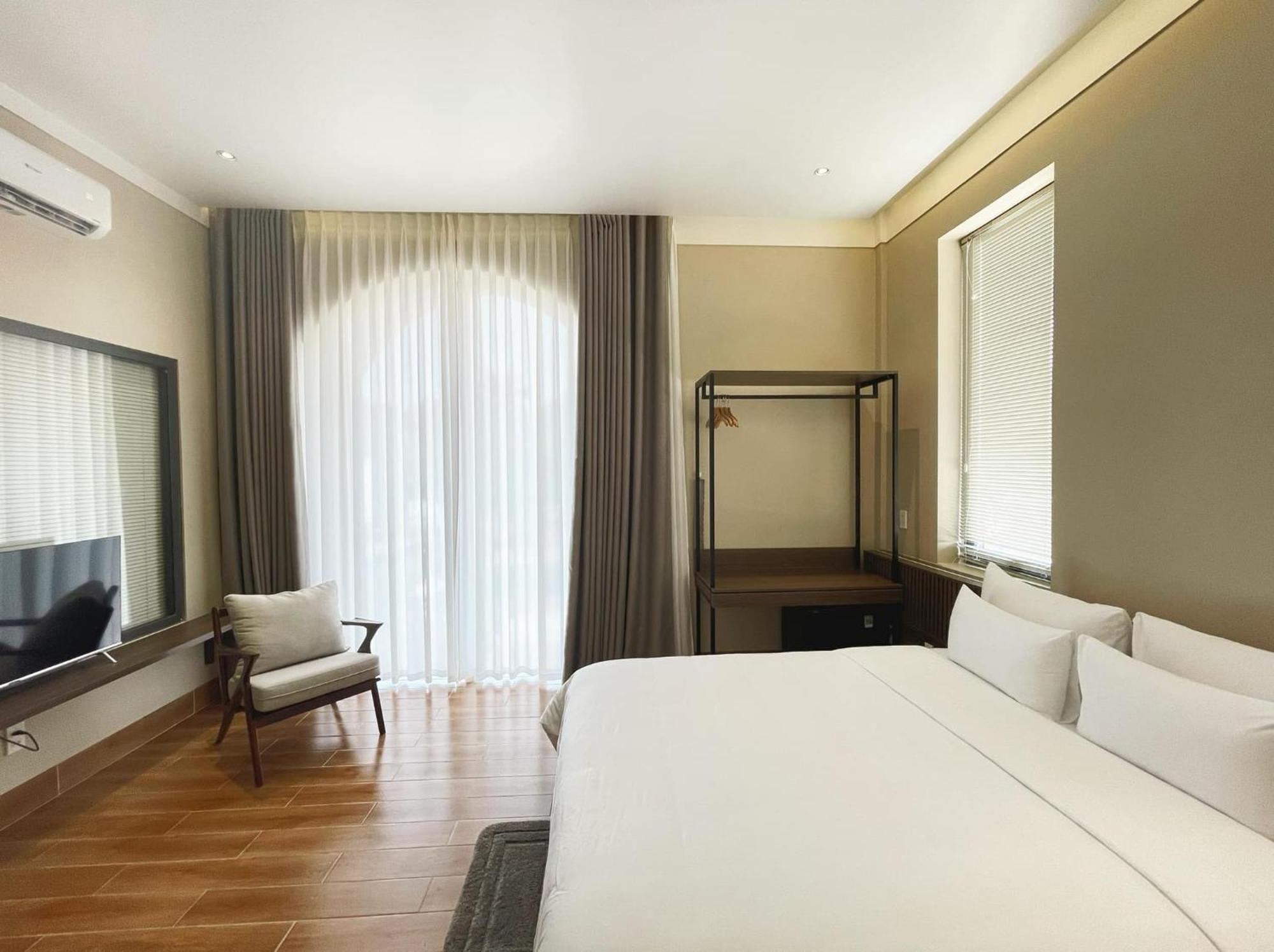 Mela Hotel My Thach Екстериор снимка