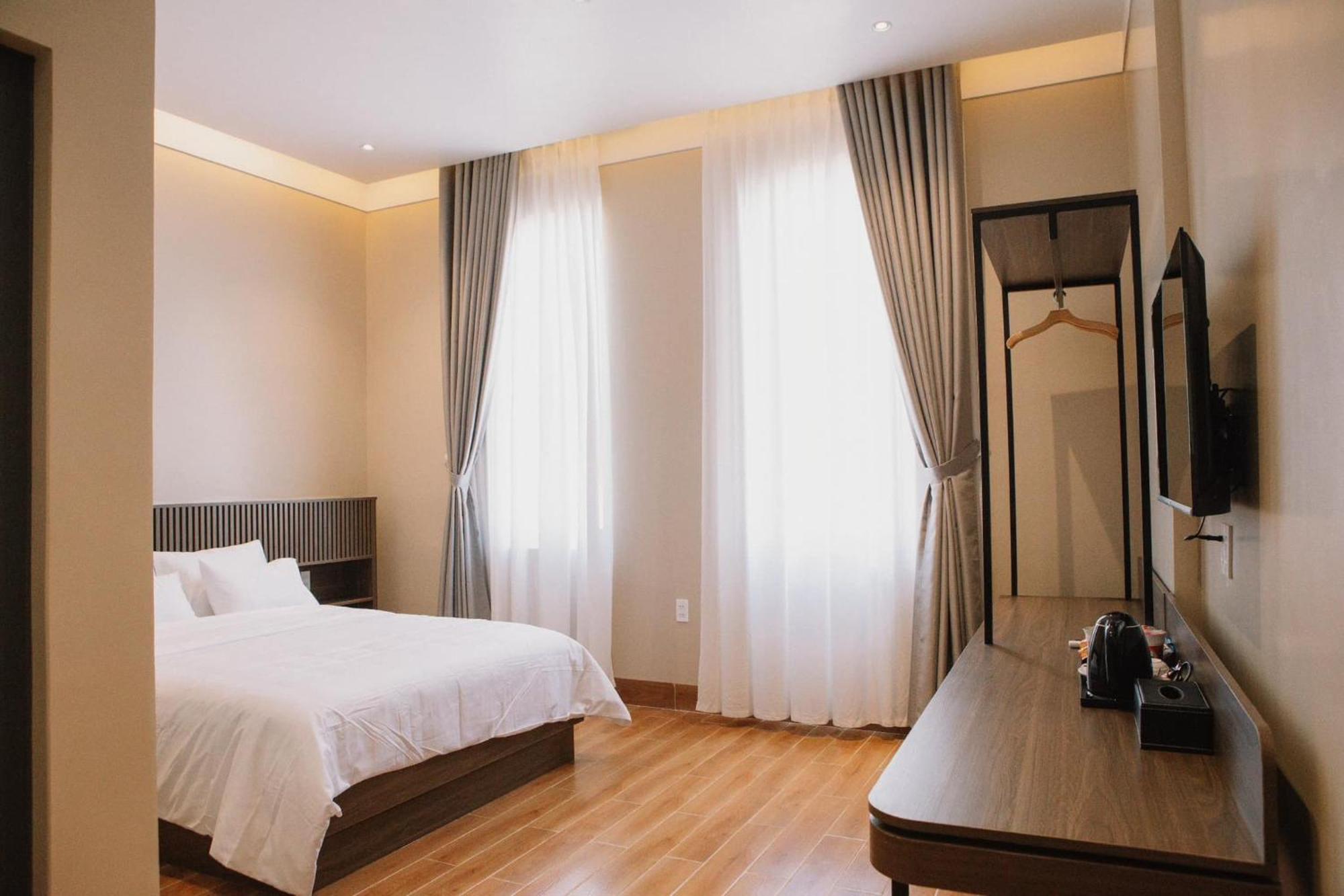 Mela Hotel My Thach Екстериор снимка
