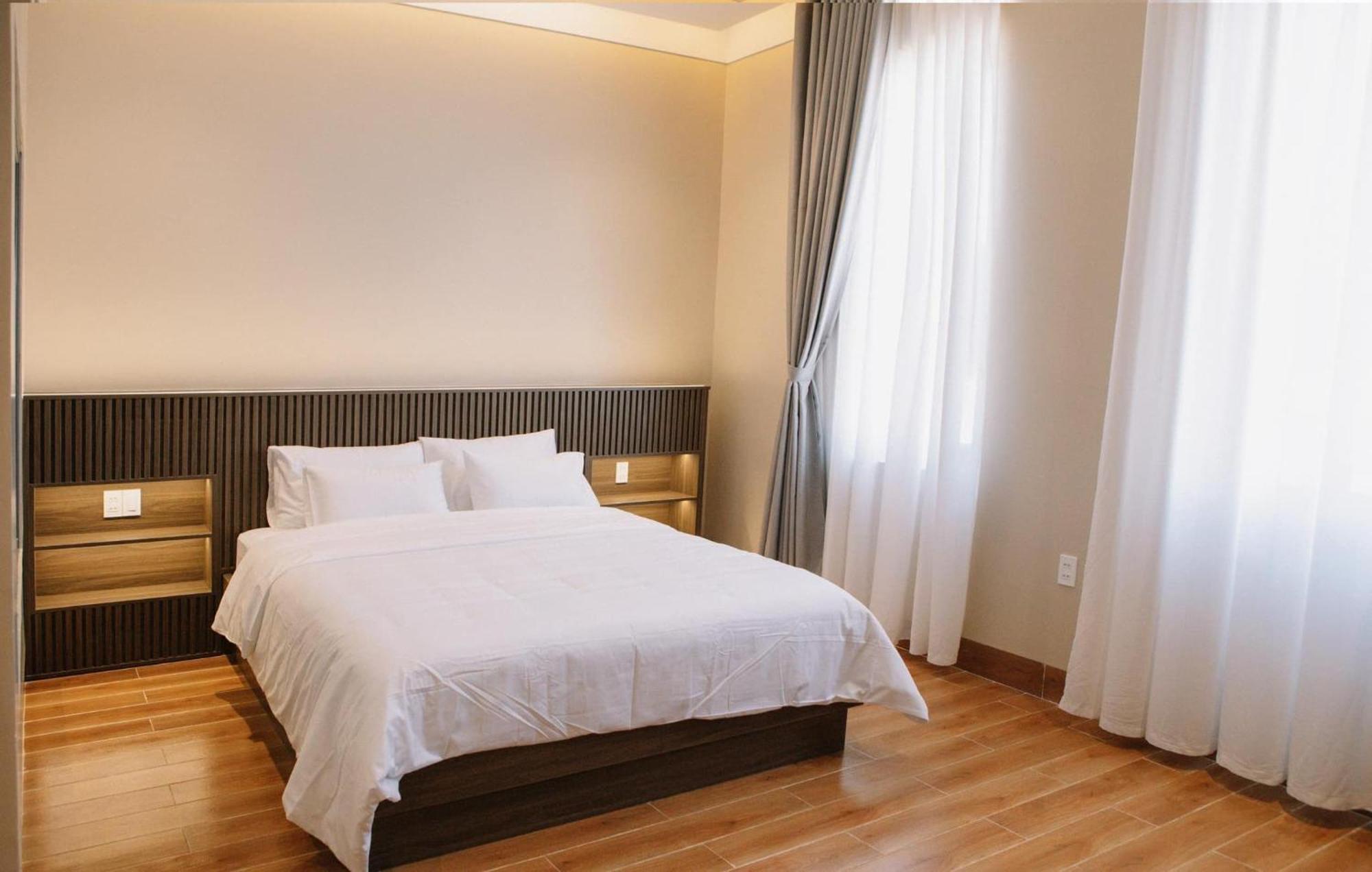Mela Hotel My Thach Екстериор снимка